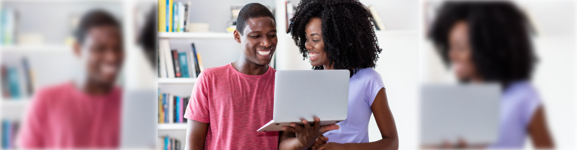 two black people with laptop